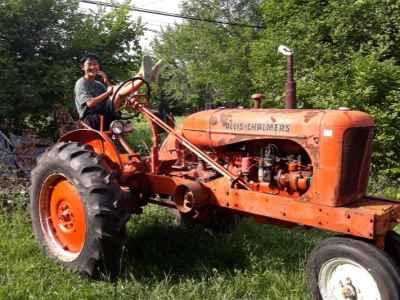 Jasper on our '39 Allis - Chalmers farm tractor