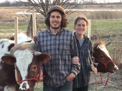 Whitney Farmers Matthew and Malaika with oxen Odin and Loki